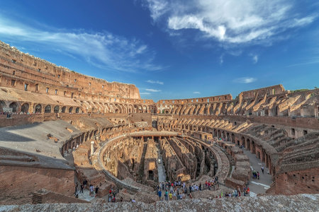 ROME, ITALY - MAY 30, 2017: Arena Coliseum at evening time, with tourists inside.