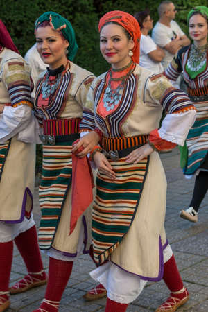 TIMISOARA, ROMANIA - JULY 6, 2017: Young dancer girls from Serbia in traditional costume present at the international folk festivalのeditorial素材