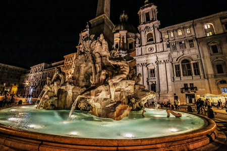 ROME, ITALY - JUNE 2, 2017: Piazza Navona, Fountain of the Four Rivers and Egyptian obelisk. Night scene.のeditorial素材