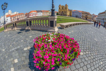 TIMISOARA, ROMANIA - AUGUST 16, 2017: View of one part at Union Square in Timisoara, Romania, with old buildings and german Dome.のeditorial素材