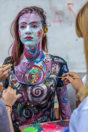 TIMISOARA, ROMANIA - SEPTEMBER 8, 2017: Face and body painting of a woman. 3D art symbolizing on live at the street, inside the CheckART Carnival organized by the City Hall Timisoara. Liberty Square.のeditorial素材