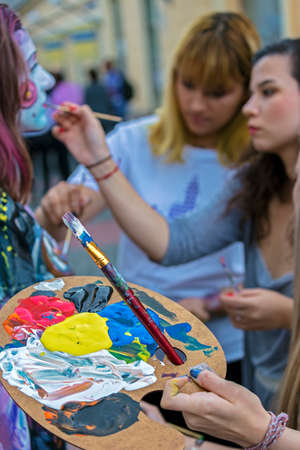 TIMISOARA, ROMANIA - SEPTEMBER 8, 2017: Face and body painting of a woman. 3D art symbolizing on live at the street, inside the CheckART Carnival organized by the City Hall Timisoara. Liberty Square.のeditorial素材