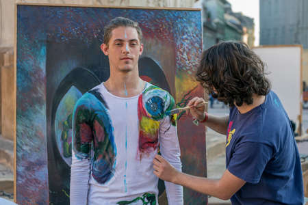 TIMISOARA, ROMANIA - MARCH 31, 2017: Face and body painting of a man. 3D art symbolizing on live at the street, inside the CheckART Carnival organized by the City Hall Timisoara. Liberty Square.のeditorial素材