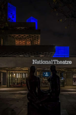 LONDON, ENGLAND - NOVEMBER 28, 2017: Night view of the Royal National Theatre, piece of the New Brutalism designed by architect Sir Denys Lasdun.のeditorial素材