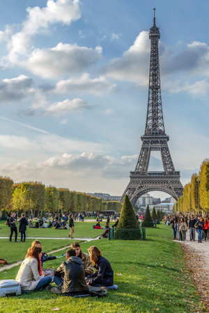 PARIS, FRANCE, OCTOBER 9, 2015: Eiffel Tower and Champ de Mars in Paris. The World Heritage Site