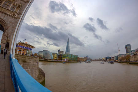 LONDON, ENGLAND - NOVEMBER 27, 2017: City view of London over river Thames from Tower Bridge, with skyscrapers, at Christmas time. City Hall, The Shard and Walkie Talkie on background.のeditorial素材