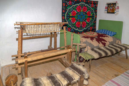 REPEDEA, ROMANIA - NOVEMBER 29, 2016: Specific objects from one interior of Romanian farmhouse, the Maramures region (part of Transylvania).のeditorial素材