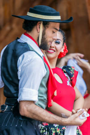 TIMISOARA, ROMANIA - JULY 9, 2017: Young dancers from Argentina in traditional costume perform at the international folk festivalのeditorial素材