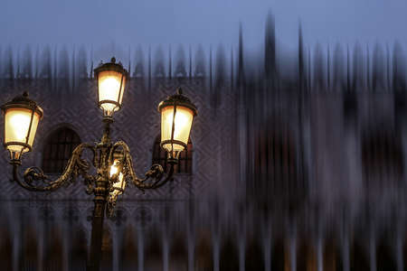 Doges Palace (Palazzo Ducale) seen from Saint Mark square at blue hour in Venice. Motion blur filter applied.の写真素材