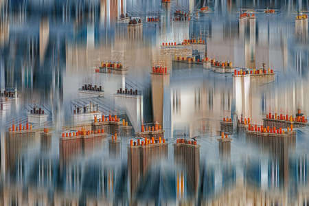 Aerial view from Eiffel tower, with roofs and colorated chimneys in Paris, France. Motion blur filter applied.の写真素材