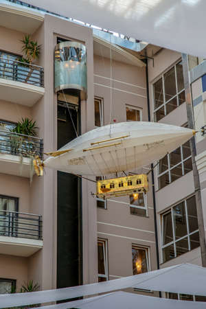 SUBOTICA, VOJVODINA / SERBIA - APRIL 28, 2018: Funny decoration with one commercial miniature travel retro airship on the ceiling of the interior gallery at Hotel Gallery.のeditorial素材