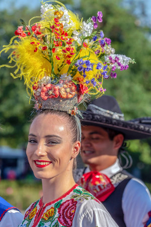 ROMANIA, TIMISOARA - JULY 5, 2018:Young woman from Ukraine in traditional costume, present at the international folk festivalのeditorial素材