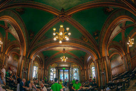 BUCHAREST, ROMANIA - JULY 16, 2018: Inside in the restaurant CARU' CU BERE (Beer Carriage Restaurant) dating from 1899 and renovated based on the project of the architect Zigfried KOFSINSKY.のeditorial素材