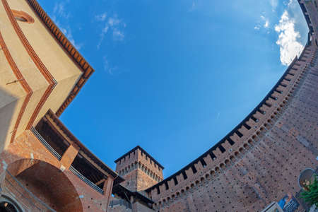 MILAN, ITALY - JUNE 22, 2018: Inside of the internal courtyard of Sforza Castle. The castle was built as from 1450 by Francesco I. Sforza, Duke of Milan. Also Leonardo Da Vinci worked there.のeditorial素材