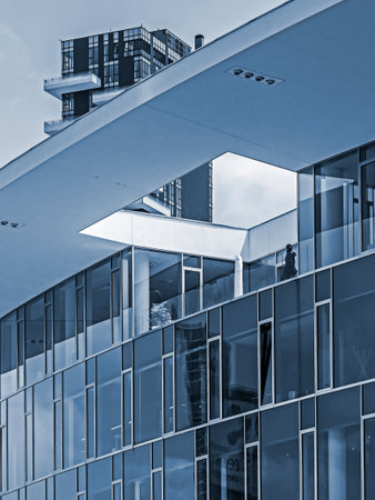 MILAN, ITALY - JUNE 22, 2018: Cyan view with one modern office building located in Gae Aulenti square, financial district at Porta Garibaldi.のeditorial素材