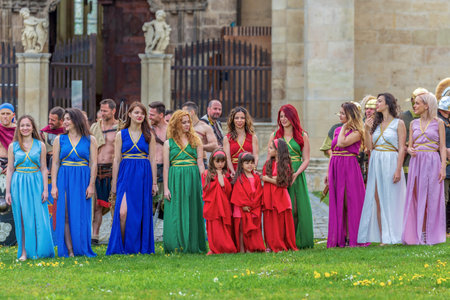 ALBA IULIA, ROMANIA - APRIL 29, 2017: Group of young Romanian girls in specific Roman dresses, at APULUM ROMAN FESTIVAL, organized by the City Hall.のeditorial素材