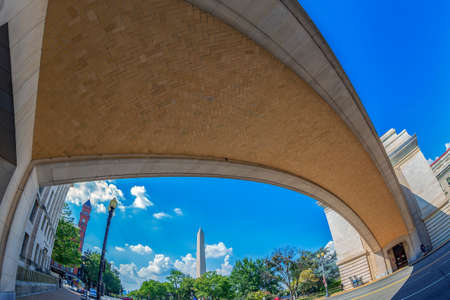 WASHINGTON DC, USA - SEPTEMBER 5, 2018: The famous Wilson and Knap recognition memorial arch at Department of Agriculture. George Washington monument in background.のeditorial素材