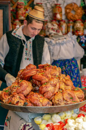 TIMISOARA, ROMANIA - DECEMBER 7, 2018: Aspects from the street Christmas fair with traditional products from Maramures area and specific atmosphere.のeditorial素材