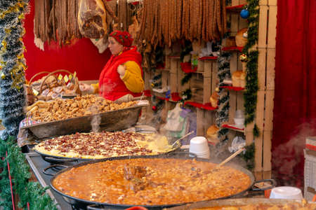 TIMISOARA, ROMANIA - DECEMBER 7, 2018: Aspects from the street Christmas fair with traditional products from Maramures area and specific atmosphere.のeditorial素材