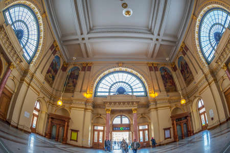 BUDAPEST,HUNGARY-DECEMBER 18,2018:Interior of Budapest Keleti railway station-Budapest Keleti palyaudvar.Designed in eclectic style by Gyula Rochlitz and Janos Feketehazy,constructed between 1881-1884のeditorial素材