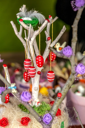 Small multicolored arrangement to decorate the house for Easter, made from children.