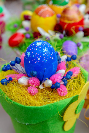 Small multi colored arrangement to decorate the house for Easter, made from children.