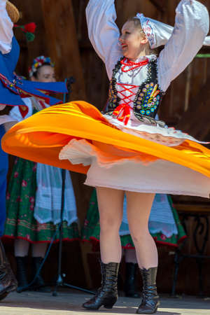 TIMISOARA, ROMANIA - JULY 9, 2017: Young Polish dancers in traditional costume perform in one show at the international folk festival International Festival of hearts organized by the City Hall.のeditorial素材