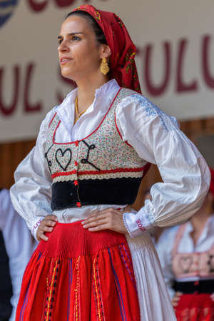 TIMISOARA, ROMANIA - JULY 9, 2017: Dancer girl from Portugal in traditional costume at the international folk festival International Festival of hearts organized by the City Hall.のeditorial素材