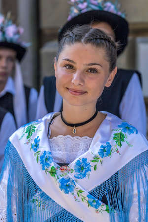 TIMISOARA,ROMANIA-JUNE 16, 2019:Portrait of one girl at the parade of the Swabian folk costumes.The days of the Germans in Banat and the meeting of the Swabian people,organized by the German Forumのeditorial素材