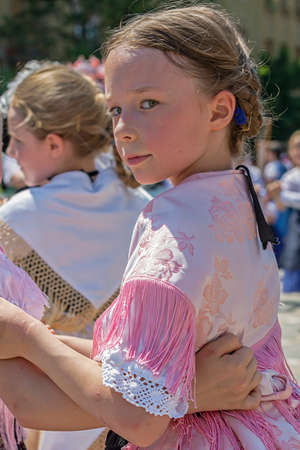 TIMISOARA,ROMANIA-JUNE 16, 2019: Childs at the parade of the Swabian folk costumes on the occasion the days of the Germans in Banat and the meeting of the Swabian people, organized by the German Forumのeditorial素材