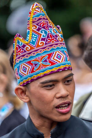 ROMANIA, TIMISOARA - JULY 4, 2017: Boy from Indonesia in traditional costume, present at the international folk festival, International Festival of hearts organized by the City Hall Timisoara.のeditorial素材