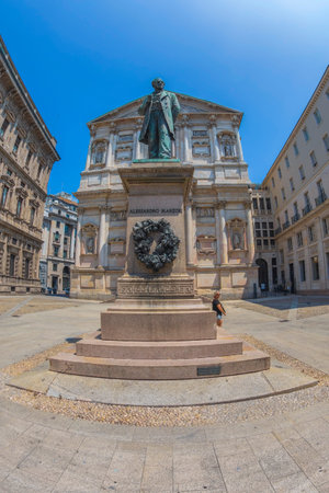 MILAN, ITALY, JUNE 28, 2019: Monument of Alessandro Manzoni in Piazza San Fedele. Was an Italian...