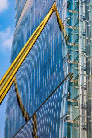 MILAN, ITALY - JUNE 28, 2019: Detail from Allianz Tower by Arata Isozaki and Andrea Maffei in City Life complex, Tre Torri Milan place. Modern buildings for Allianz financial insurance companies.のeditorial素材