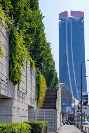 MILAN, ITALY - JUNE 28, 2019: Generali Tower by Zaha Hadid in City Life complex, Tre Torri Milan place. Modern buildings for Generali financial insurance companies.のeditorial素材