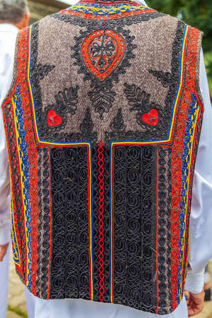 Background with detail from traditional Romanian folk costume for man, specific on Banat area.の写真素材