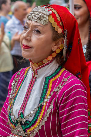 TIMISOARA, ROMANIA - JULY 4, 2019: Portrait of mature dancer women from Turkey in traditional costume present at the international folk festival, Festival of hearts, organized by the City Hall.のeditorial素材