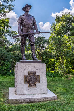 ARLINGTON, VIRGINIA, USA - AUGUST 31, 2018: The Hiker, a statue that commemorates the American soldiers who fought in the Spanish-American War. Located before entering of Arlington National Cemetery.のeditorial素材