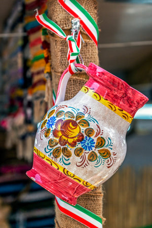 Rustic decoration with traditional ceramic cup, painted with specific patterns for Hungary.