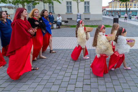 ALBA IULIA, ROMANIA - APRIL 30, 2017: Group of young Romanian girls in specific Dacian dresses, at APULUM ROMAN FESTIVAL, organized by the City Hall.のeditorial素材