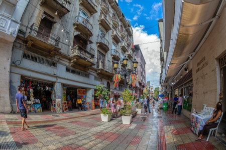 SANTO DOMINGO, DOMINICAN REPUBLIC - MARCH 13, 2020: Small souvenir shops located on the picturesque...