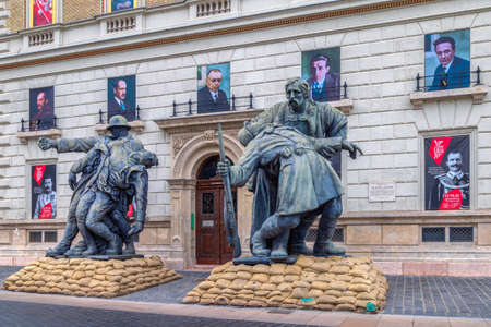 BUDAPEST, HUNGARY - AUGUST 23, 2021: Statue group in front of the Varkert Bazar Deli Palotak history museum located in Ybl Miklos ter.のeditorial素材