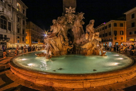 ROME, ITALY - JUNE 2, 2017: Piazza Navona, Fountain of the Four Rivers and Egyptian obelisk. Night scene.のeditorial素材