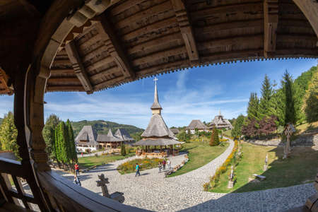 BARSANA, MARAMURES, ROMANIA-SEPTEMBER 19,2020: Buildings in the Barsana monastic complex. The first wooden church was built in 1711 and the Orthodox Barsana Monastery is included in UNESCO world heritageのeditorial素材
