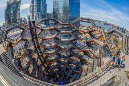 New York, USA - March 8, 2020: The Vessel, project by architect Thomas Heatherwick, also known as Hudson Yards Staircase, in Manhattan. Afternoon light.のeditorial素材