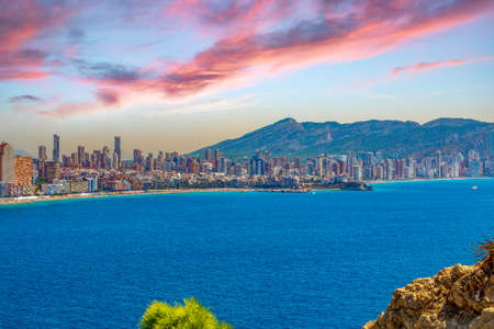 BENIDORM, SPAIN - AUGUST 14, 2020: View of skyscrapers of the city from the Tossal de la Cala, a hill located between Poniente Beach and Finestrat Beach. The city is considered Manhattan of Spain.のeditorial素材