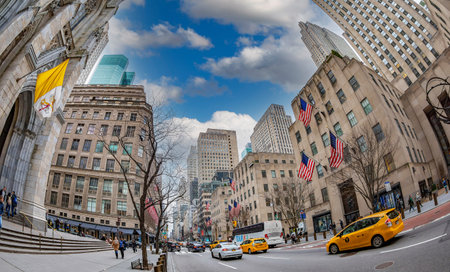 NEW YORK, USA - MARCH 6, 2020: View of Fifth Avenue with St. Patrick's Cathedral, Rockefeller Group...