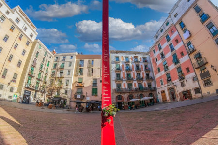BARCELONA, SPAIN - FEB. 27, 2022: Plaza Fossar de les Moreres, a memorial square with a monument, a flame and the engraved poem by Frederic Soler, in homage to the dead of the 1714 War of Succession.のeditorial素材