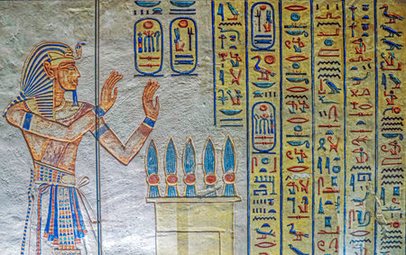 Luxor,Egypt-24 April 2022:Frescos inside of the ancient necropolis Valley of the Queens,burial site...