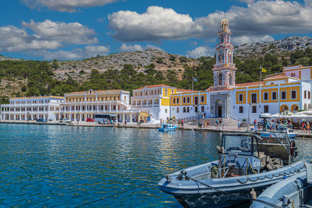 PANORMITIS, GREECE - JULY 3, 2022: Panormitis Port and the Monastery of St. Archangel Michael of...