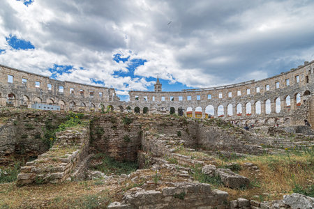 PULA, CROATIA-JUNE 8, 2022:The Pula Arena, a Roman amphitheatre and the only remaining who has four side towers entirely preserved. Build between 27 BC-AD 68.Among the world's 6 largest Roman arenas.のeditorial素材